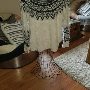 Cream fuzzy sweater.